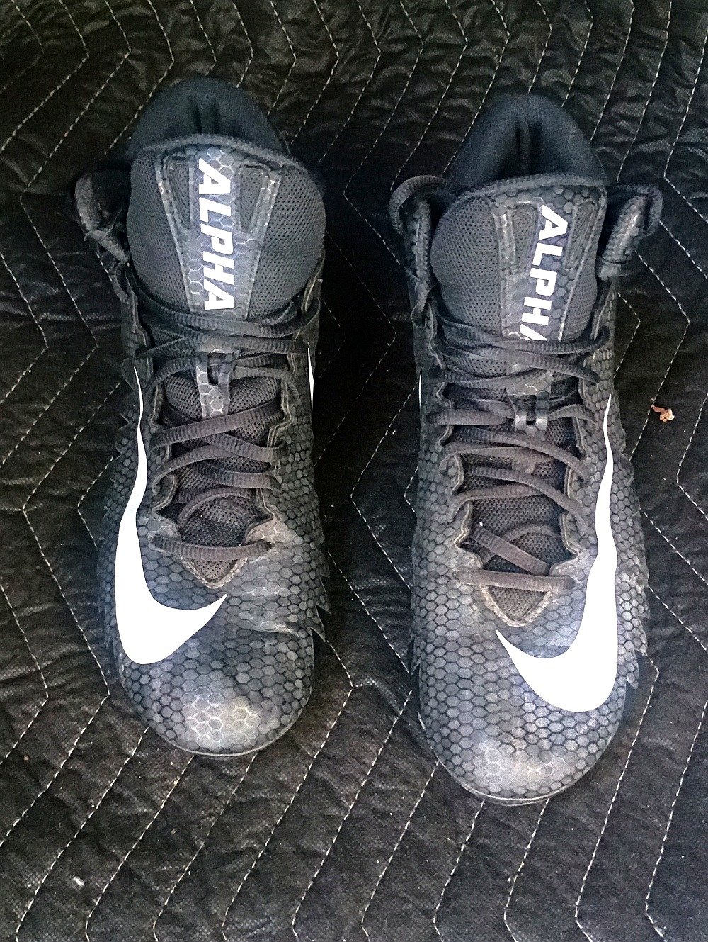 Nike Men's Black Athletic Cleats with White Swoosh